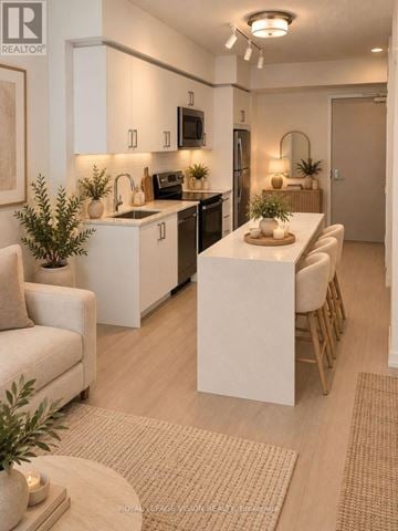 Toronto (Humber Heights) condo for rent - A modern kitchen with a dining table and chairs.