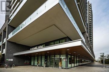Toronto (Flemingdon Park) condo for rent - A modern building with the name "ZSONIC WAY" on the front.