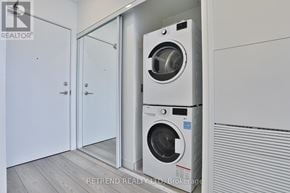 Toronto (Church-Yonge Corridor) condo for rent - A washing machine is placed in a laundry room.