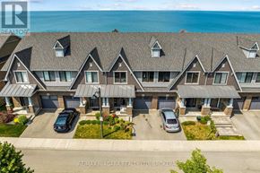 Grimsby (Grimsby Beach) townhouse for rent - A bird's eye view of a row of houses with cars parked in front.