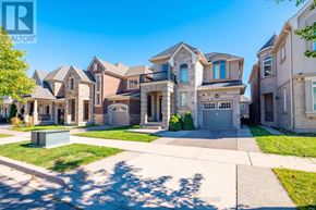 Oakville (Go Glenorchy) apartment for rent - A row of houses with a realtor logo in the corner.