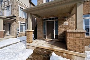 Oakville (Jm Joshua Meadows) townhouse for rent - A house with the number 3215 on the front door.