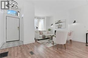 Hamilton townhouse for rent - A realtor logo is on the top left corner of the image.