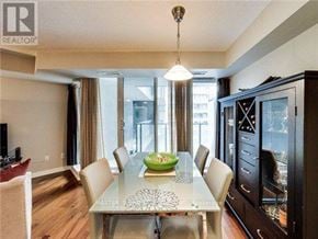 Toronto (Bay Street Corridor) condo for rent - A dining room with a table set for six.
