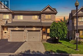 Cambridge townhouse for rent - A house with a garage and a sign that says "No Parking".