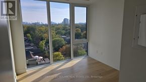 Toronto (Annex) condo for rent - A realtor's office with a view of the city.