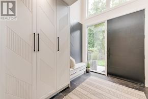Toronto (Birchcliffe-Cliffside) apartment for rent - A room with a large white cabinet and a grey door.