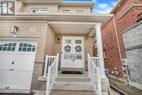 Brampton (Bram East) apartment for rent - A house with a white door and a garage door.