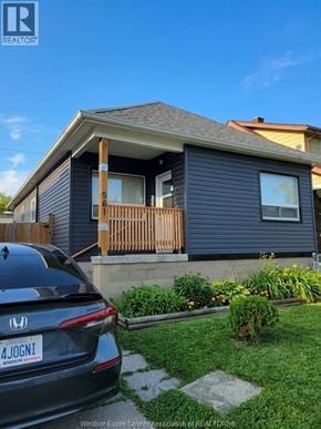 Windsor apartment for rent - A house with a car parked in front of it.