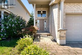 London North (North I) apartment for rent - A house with a brown door and a garage door.