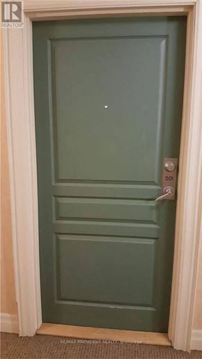 Brampton (Fletcher's Creek South) condo for rent - A green door with a silver handle and a number 501 on it.