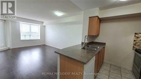 Brampton (Fletcher's Creek South) condo for rent - A kitchen area with a sink and a window.