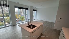 Toronto (Church-Yonge Corridor) condo for rent - A kitchen with a sink and a window overlooking a city.