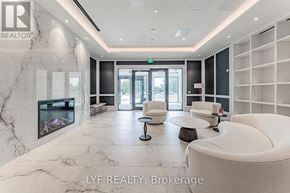 Toronto (Humber Heights) condo for rent - A spacious waiting area with white furniture and a marble floor.