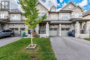 Caledon townhouse for rent - A large house with a tree in front of it.