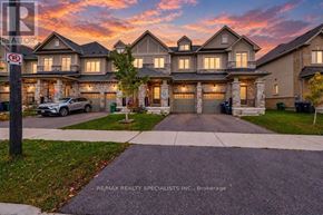 Caledon townhouse for rent - A large, well-maintained house with a driveway and a car parked in front.