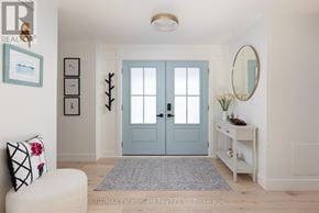 Burlington (Roseland) apartment for rent - A blue door is in the middle of a white wall.