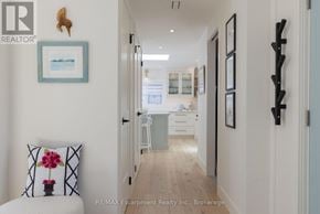Burlington (Roseland) apartment for rent - A hallway with a white pillow and a picture frame on the wall.