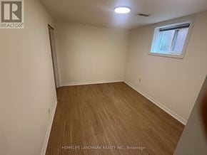 Toronto (Lansing-Westgate) apartment for rent - A room with wooden flooring and a window.