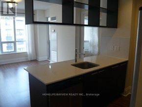 Toronto (Willowdale East) condo for rent - A kitchen with a sink and a window.