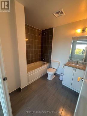 Toronto (Tam O'shanter-Sullivan) condo for rent - A bathroom with a toilet, sink, and bathtub.