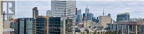 Toronto (Bay Street Corridor) condo for rent - A cityscape with the word "LOYALTY" visible on a building.