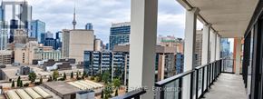 Toronto (Bay Street Corridor) condo for rent - A cityscape with tall buildings and a clear sky.