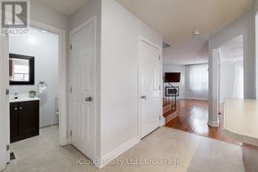 Brampton (Fletcher's West) apartment for rent - A white bathroom with a sink, toilet, and bathtub.