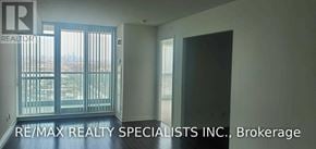 Toronto (Islington-City Centre West) condo for rent - A room with a view of a cityscape through a window.