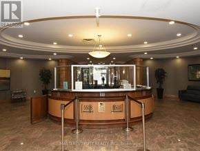 Toronto (Willowdale West) condo for rent - A reception area with a desk and a sign that reads 5508.