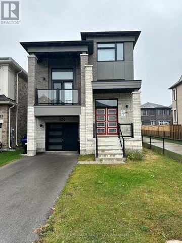 Innisfil apartment for rent - A white door with a glass window is closed.