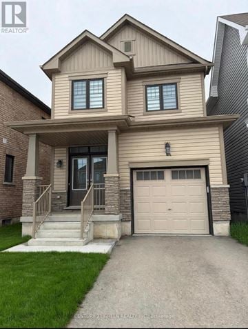 Thorold (Rolling Meadows) apartment for rent - A two-story house with a garage is for sale.