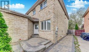 Brampton (Northwood Park) apartment for rent - A brick house with a white door and windows is for sale.