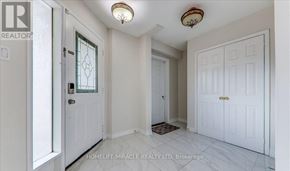 Brampton (Northwood Park) apartment for rent - A white door with a glass window is in a room with white walls.