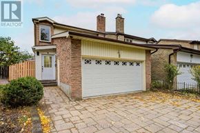 Markham (Milliken Mills West) apartment for rent - A house with a garage and a chimney is for sale.