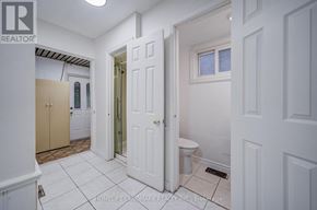 Markham (Milliken Mills West) apartment for rent - A white bathroom with a toilet, sink, and shower.