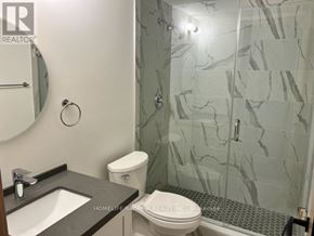 Toronto (L'amoreaux) townhouse for rent - A bathroom with a marble shower and toilet.