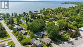 Georgina (Keswick North) duplex for rent - A bird's eye view of a residential area with houses and trees.