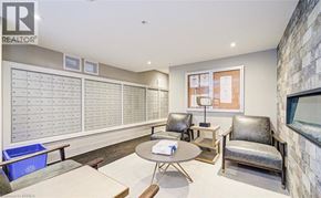 Milton condo for rent - A realtor's office with a whiteboard and a table.