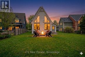 Blue Mountains apartment for rent - A family is sitting on a lawn in front of a house with the text "CV Real Estate, Brokerage" on the image.
