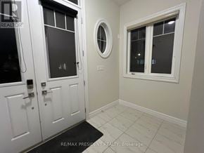 Hamilton (Stoney Creek Mountain) apartment for rent - A white door with a glass window and a round window above it.