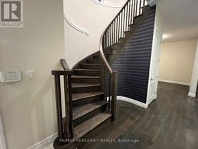 Hamilton (Stoney Creek Mountain) apartment for rent - A wooden staircase with a metal railing.