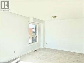 Grimsby apartment for rent - A room with a window and wooden flooring.