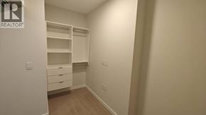 Burnaby apartment for rent - A white closet with drawers and shelves.