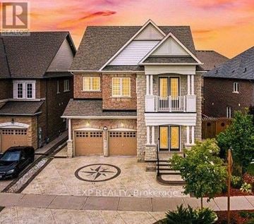 Caledon apartment for rent - A house with a car parked in front and a sign that says EXP REALTY Blokerage.