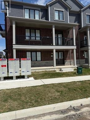 Haldimand townhouse for rent - A building with a sign that says "REALTOR" on it.