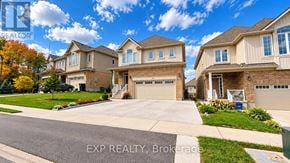Waterloo apartment for rent - A row of houses with the text EXP REALTY, Brokerage on the bottom.