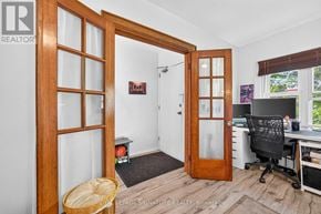 Toronto (South Riverdale) apartment for rent - A room with a desk and a chair in it.
