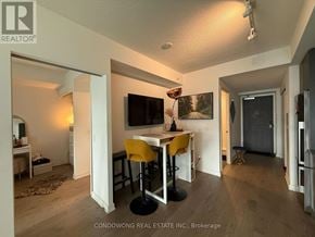 Toronto (Church-Yonge Corridor) condo for rent - A room with a desk and chairs in it.