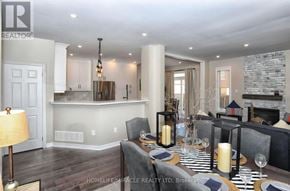 Brampton (Bram West) apartment for rent - A well-lit dining room with a table set for a meal.